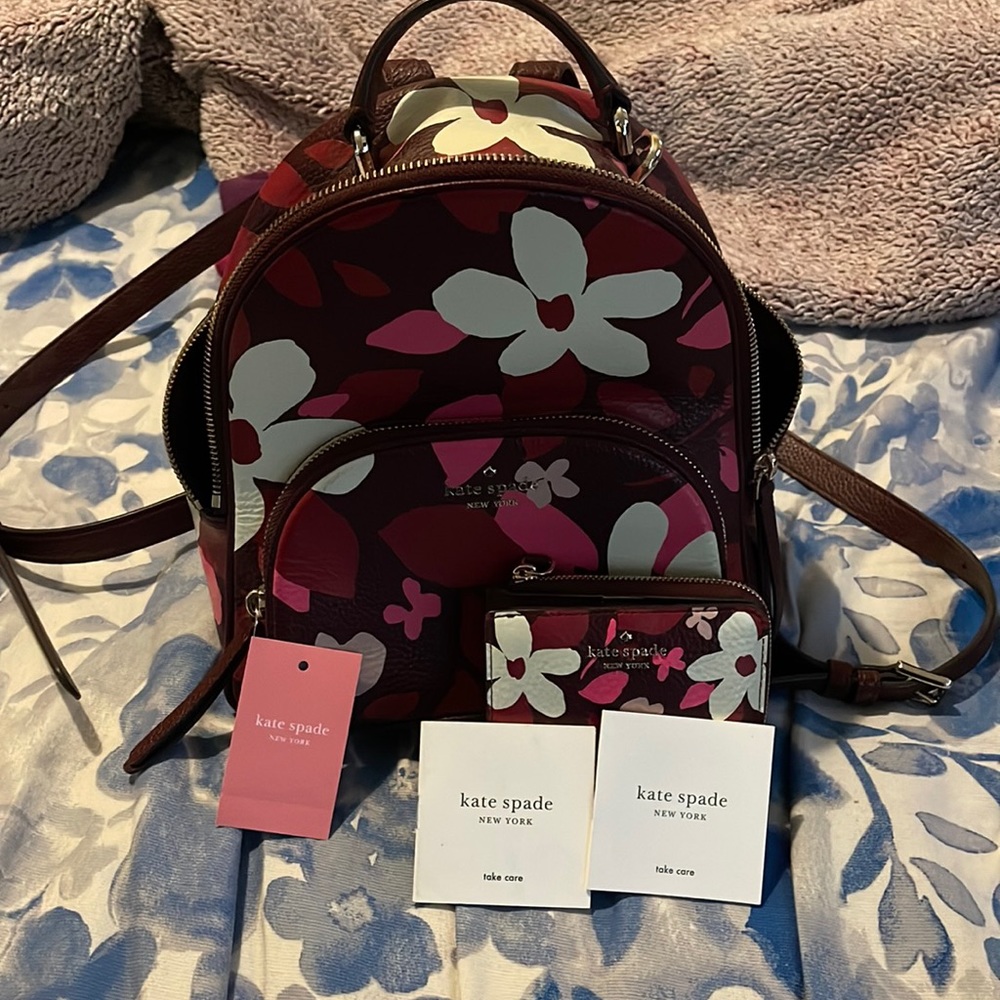 Kate Spade Backpack mini super cute used once no need for it matching wallet